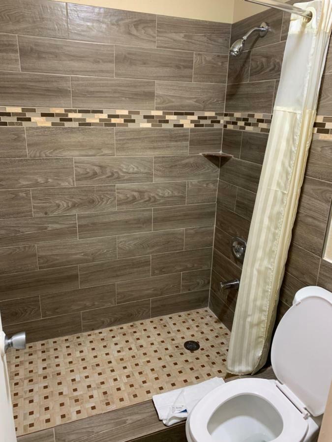Guest Inn And Suites Houston Chambre photo